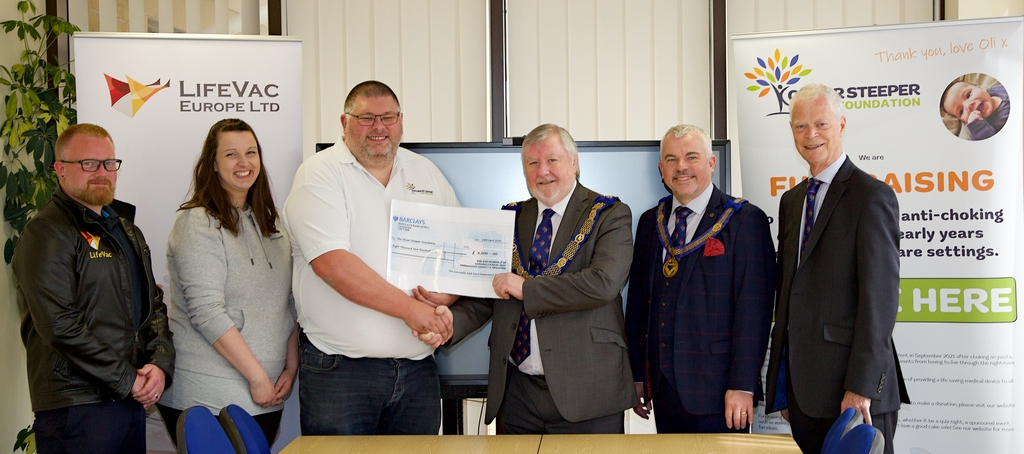 Oliver Steeper Foundation4 The Family with the Deputy Provincial Grand Master Philip South presenting the cheque